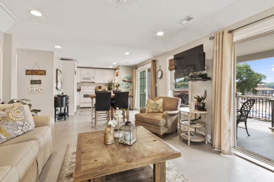 open space living room and kitchen with lake view at Home across the street from the beach in Lake Geneva