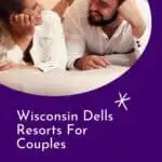 a pin with a couples smiling to each other on a bed at one of the best Wisconsin Dells Resorts For Couples.