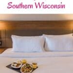 a pin with a breakfast on a bed at one of the best Resorts In Southern Wisconsin