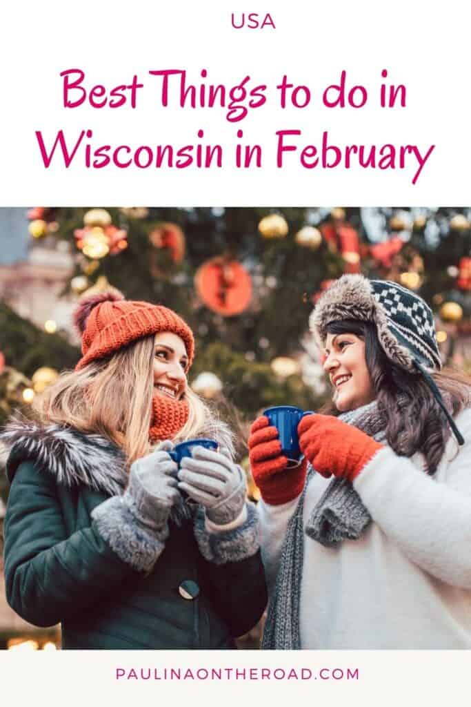 Pin with image of two smiling women in winter coats, hats and gloves holding cups of a warm drink with a brightly decorated Christmas tree behind them, caption reads: USA, Best Things to do in Wisconsin in February from paulinaontheroad.com