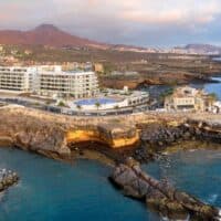 aerial view of H10 Atlantic Sunset with beach location and mountain view. Where to stay in Tenerife in January