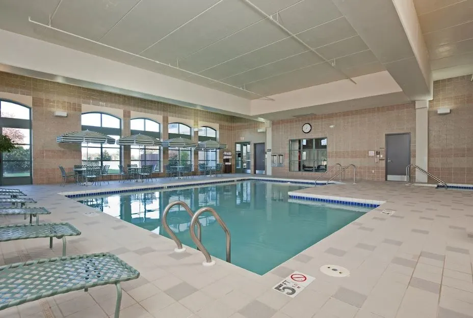 pool area with lounges at DoubleTree by Hilton Pleasant Prairie in Kenosha, Wisconsin