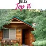 a pin with a wooden cabin in the woods, one of the best cabins in Wisconsin Dells