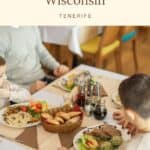 Family Resorts In Wisconsin a pin with a family eating at a restaurant at one of the best Family Resorts In Wisconsin