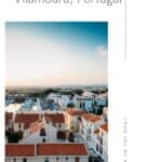 Pin with image of a view looking out across the rooftops of residential buildings towards a harbor lined with small white boats and the rolling green hills beyond under a bright blue sky, caption reads: Best Things to Do in Vilamoura, Portugal from Paulina on the Road