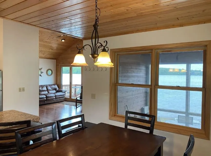 spacious living room with lake view at the family Beach Retreat in Sarona, Wisconsin