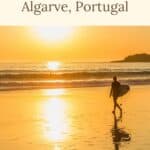 a pin about best things to do in algarve showing a photo of a woman at th beach carrying a surfboard facing the sunset