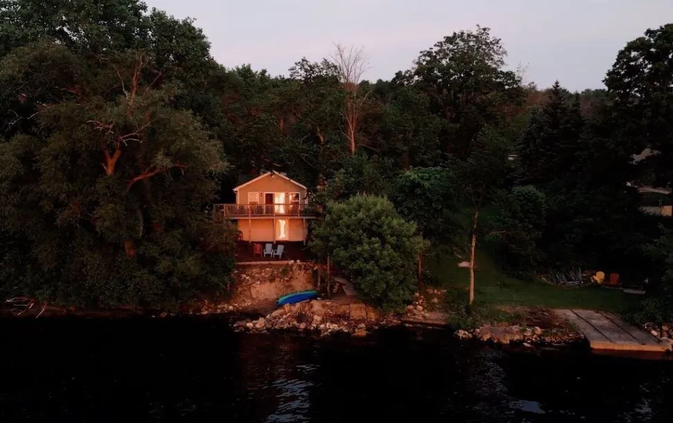 aerial view from the lake of the Secluded Lake House Retreat in Hilbert, Wisconsin