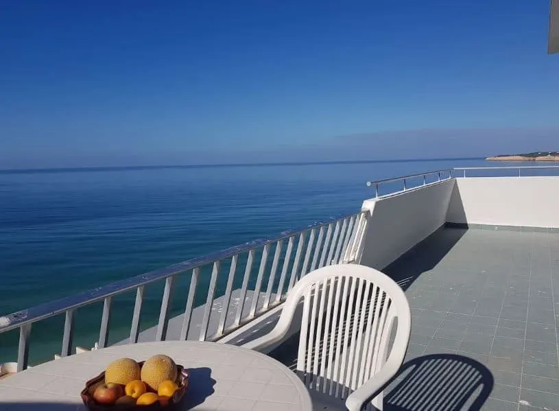 balcony with sea view at the Beachfront Penthouse in Armação de Pêra, Portugal