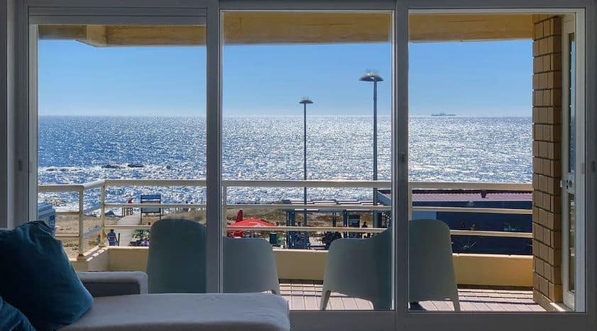 living room with sea view at the Beachfront apartment with sunny balcony in Vila Nova de Gaia, Portugal
