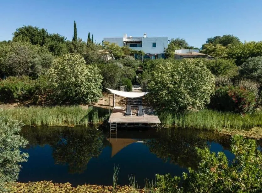 small lake surrounded by green areas at the Altanure - Casa Terra Ecological Boutique Hotel in Tavira, Algarve