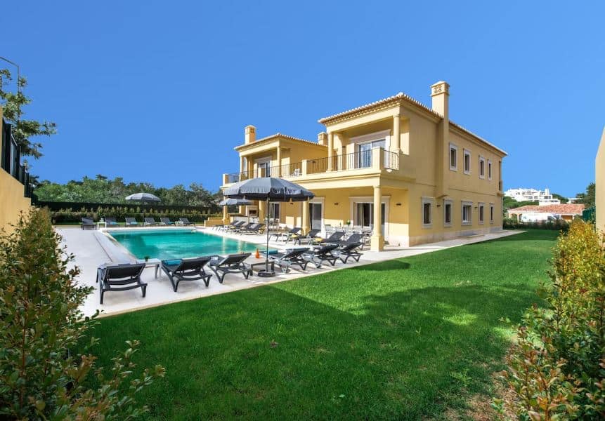 pool area with sun lounges, garden at the Luxury 14 bedroom Quinta De Carmo in Albufeira, Portugal