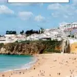 Pinterest pin about things to do in Albufeira in March showing fisherman's beach with view of old town