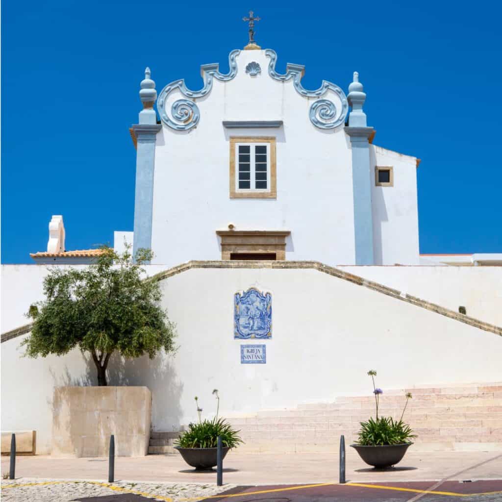 View of historic white walls of Church of Sant'Ana in Albufeira, Portugal