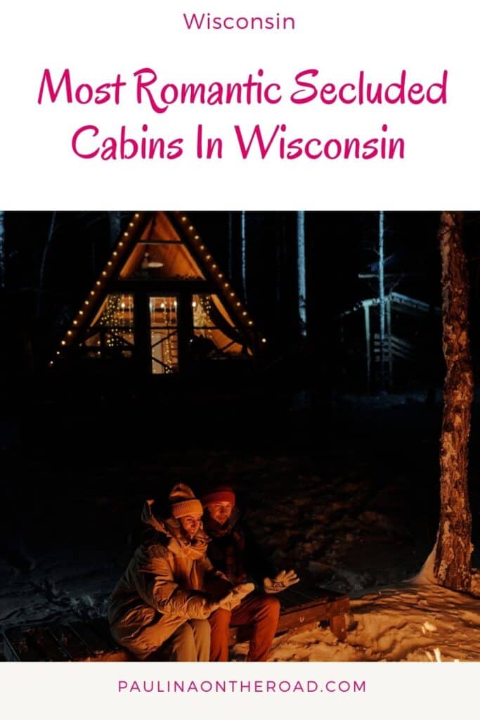 a pin with a couple by the fire in front of one of the most Romantic Secluded Cabins In Wisconsin. 