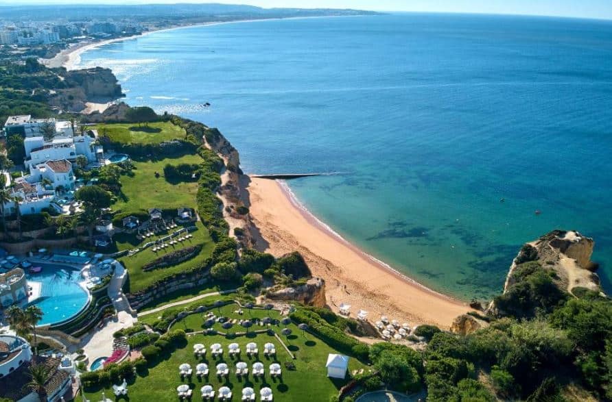 aerial view of the beach and sea where you can find best Accommodation In Algarve