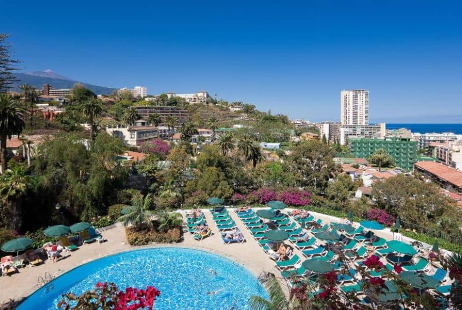 aerial view of the pool area with sun lounges at Hotel Atlantic El Tope in Tenerife