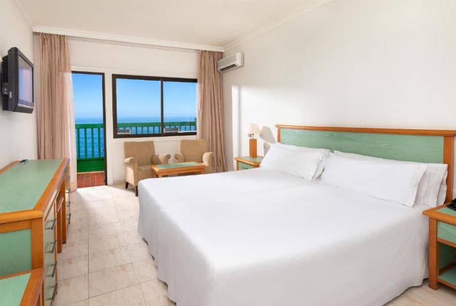 bedroom with sea view at Sol Puerto de la Cruz Tenerife