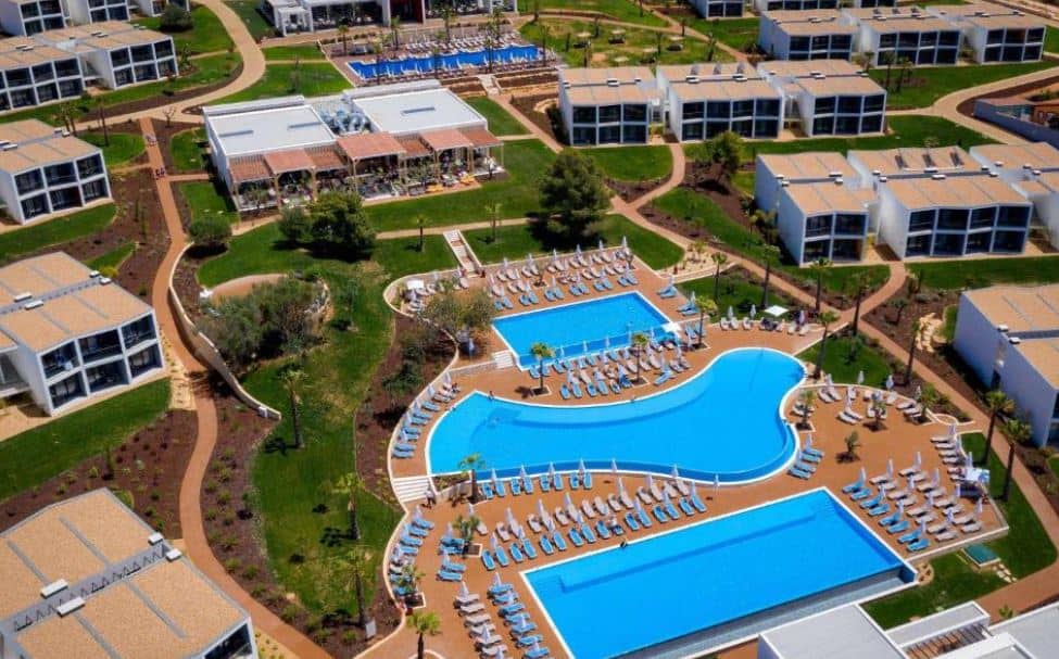 pool area with sun lounges at Tivoli Alvor Algarve - All Inclusive Resort in Alvor