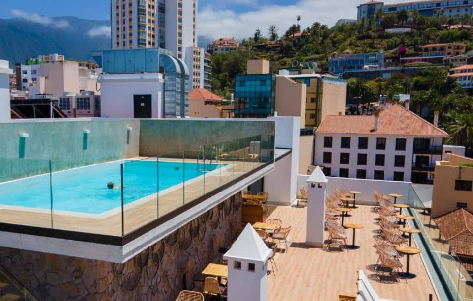 relaxing pool with city view at DWO Nopal in Tenerife