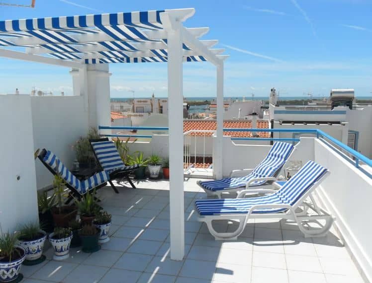 rooftop balcony with city and sea view at the Deluxe Penthouse Apartment by the Sea in Tavira, Algarve