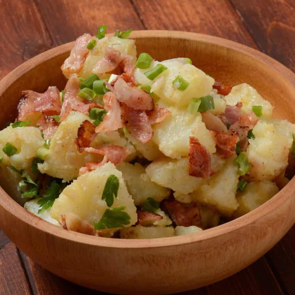 Gebootschten Gromperen, boiled potatoes with bacon and herbs