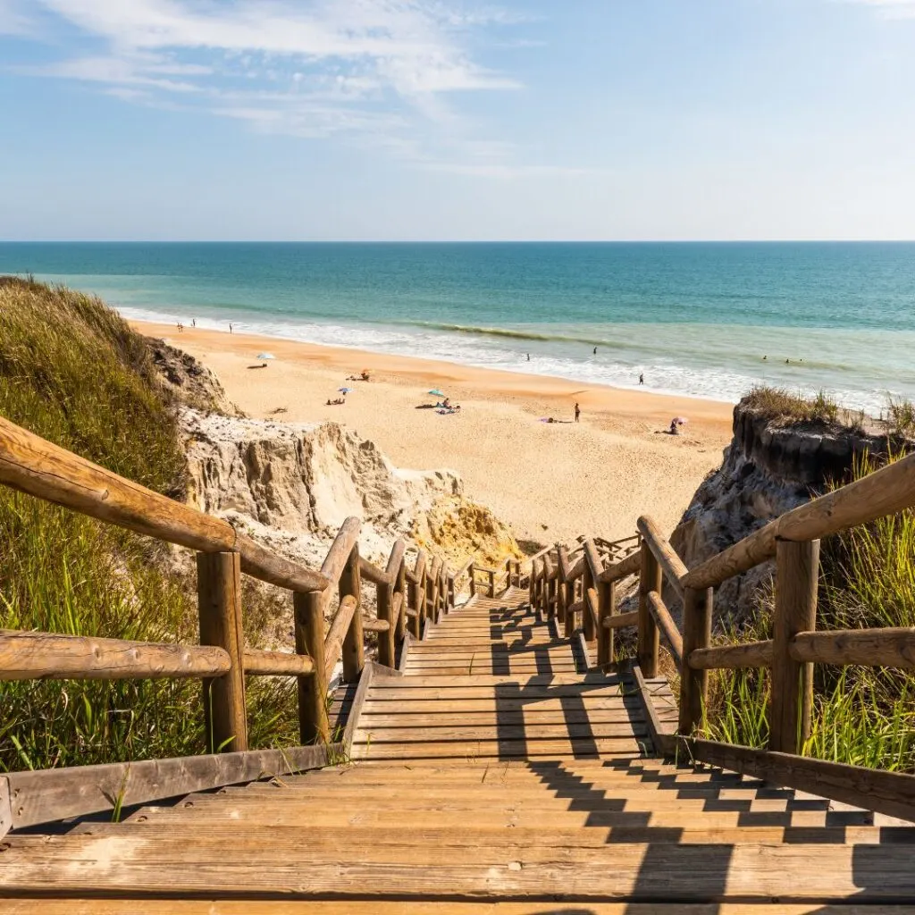 Stunning cliffs and sandy beaches in Praia da Falésia, one of best things to do in albufeira in june