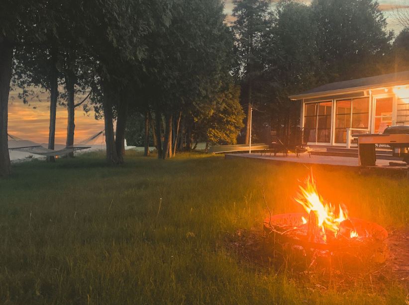 bonfire in the garden of the Dreamy Lakefront Cabin in Algoma, Wisconsin