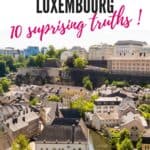 Pinterest pin about interesting facts about luxembourg showing photo of luxembourg old town in clear sunny day