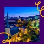 Pinterest pin about things to do in luxembourg by night, old town illuminated with lights