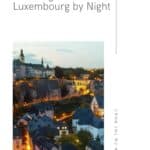 Pinterest pin about things to do in luxembourg by night, old town illuminated with yellow lights