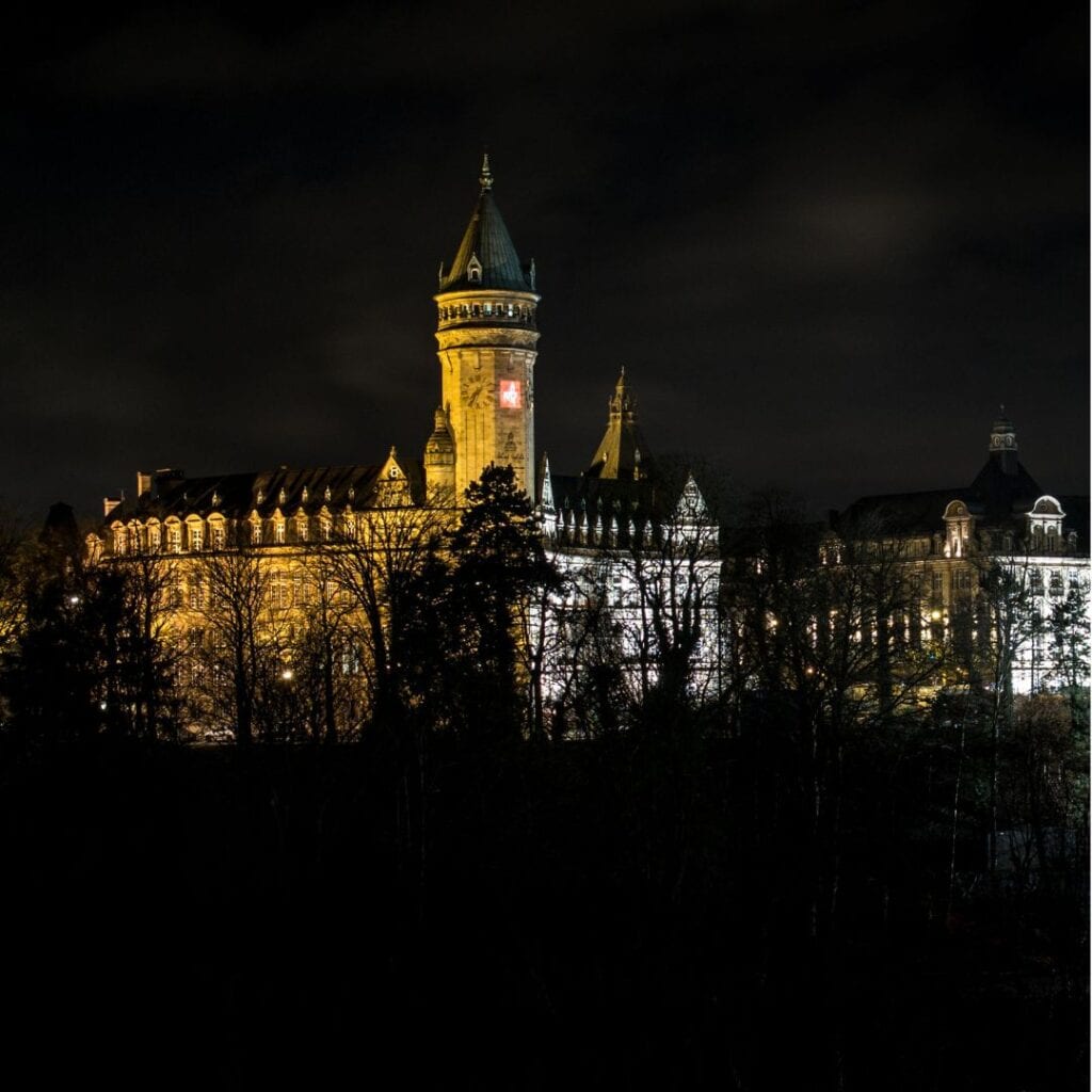 Night shot of Luxembourg Park with silhouette of Musée de la Banque