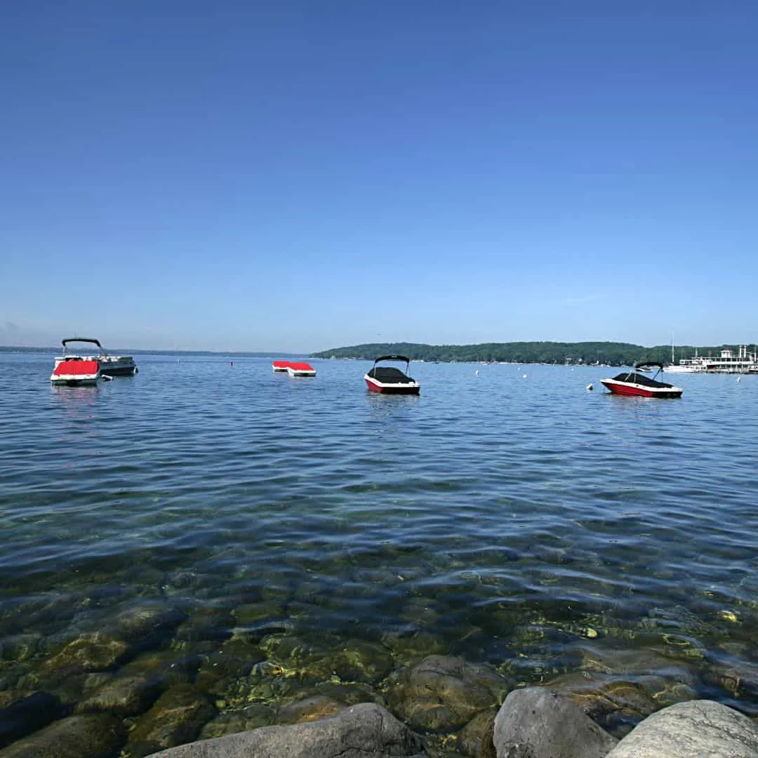 several speedboats docked on the beautiful waters of lake geneva, wisconsin