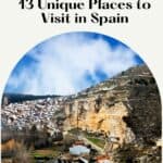 Pinterest title about unique places to visit in spain showing photo of city with rock formations, Alcalá del Júcar