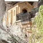 Pinterest title about unique places to visit in spain showing holy cave in covadonga sanctuary