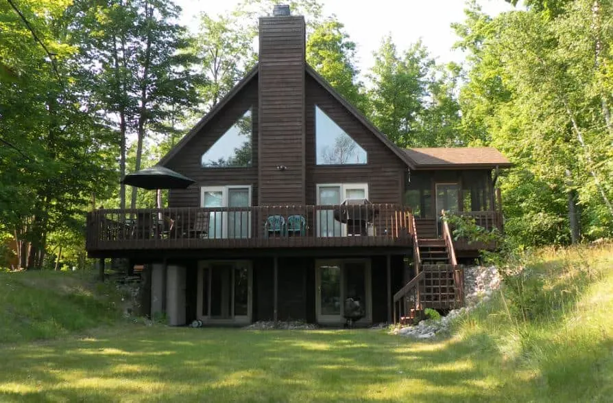 Beautiful Wisconsin Lakefront Rental in Park Falls with garden and forest around it in Wisconsin