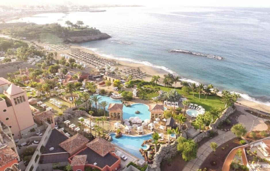 aerial view of the Iberostar Grand El Mirador in Adeje, Tenerife located on the beach, Where To Stay In Costa Adeje