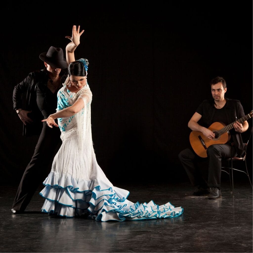 two flamenco dancers with a guitar player in madrid