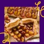 Pinterest pin about Luxembourg desserts showing photo of damson plum tart