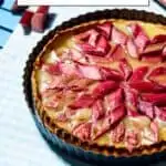 Pinterest pin about Luxembourg desserts showing photo of rhubarb tart in cake tin