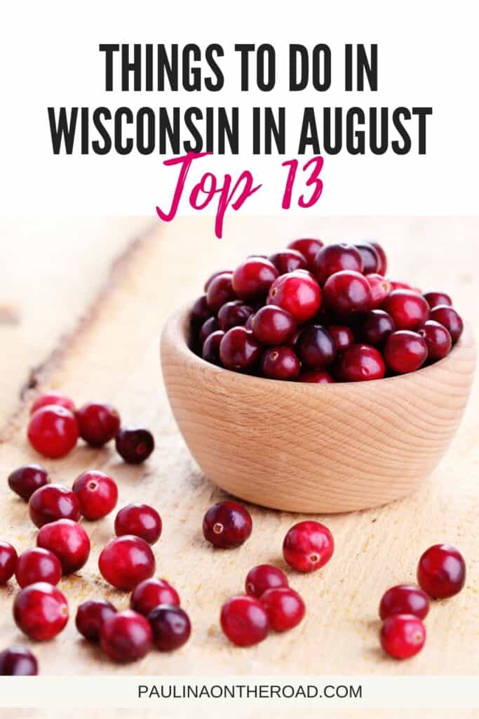 cranberries in a wooden bowl on a wooden surface