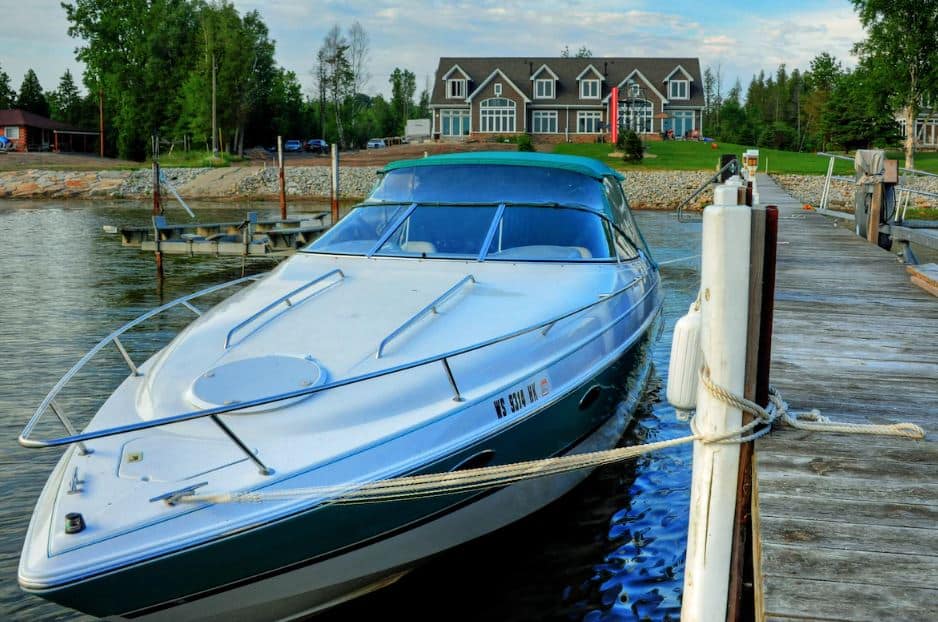 boat in front of the Beautiful Waterfront Home With Swimming Pond in Door County, Wisconsin