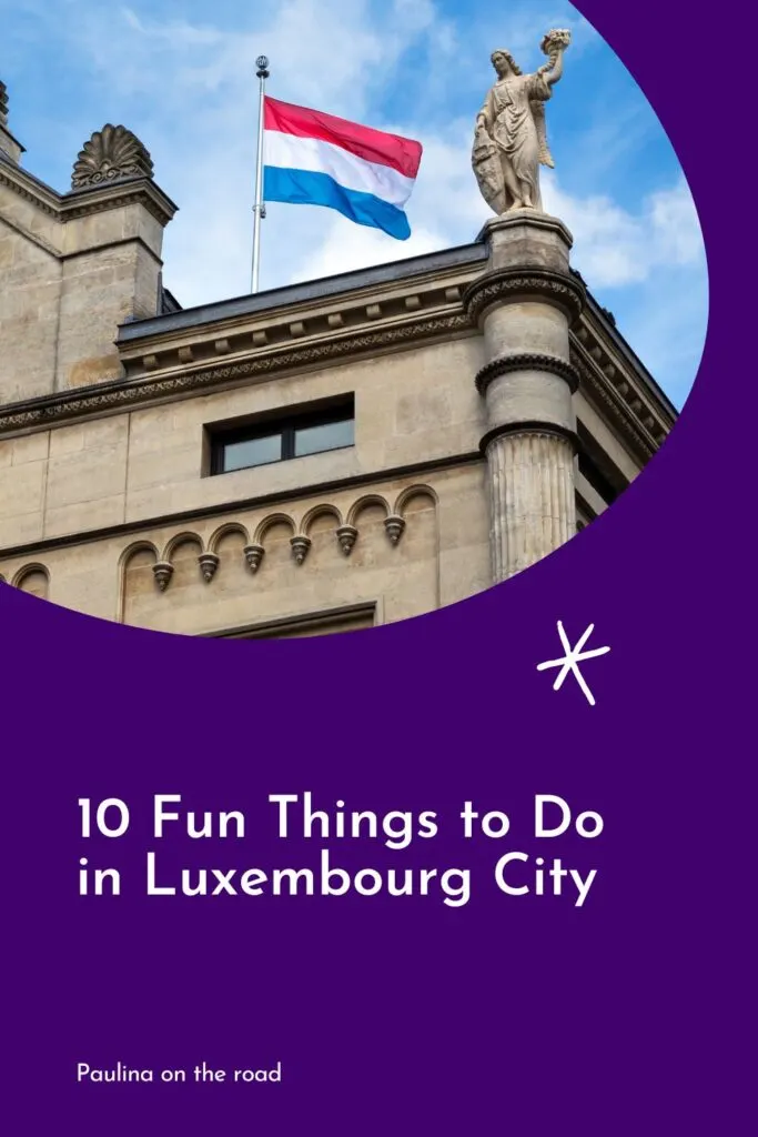 Pinterest pin about fun things to do in luxembourg city showing a photo of the Luxembourg flag on top of a gray and brown historical building