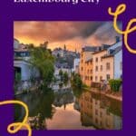 Pinterest pin about fun things to do in luxembourg city showing a photo of the sunset view of the Grund neighborhood in Luxembourg City, featuring the Alzette River winding through the historic district with colorful facades lining the waterfront.