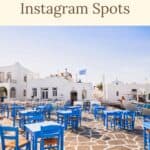 A Pinterest pin about Paros Greece Instagram spots featuring a photo of a picturesque outdoor cafe with blue tables and chairs in Naousa, Paros, Greece.