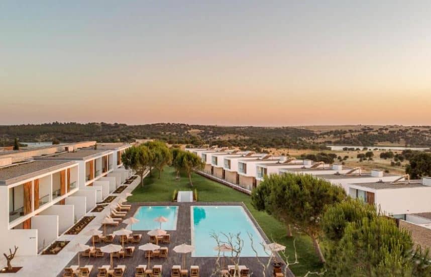 pool area with sun lounges at Octant Evora in Alenteja, Portugal, Best Resorts In Alentejo