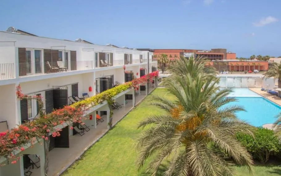 pool area with sun lounges next to the Hotel Dunas de Sal in Cape Verde