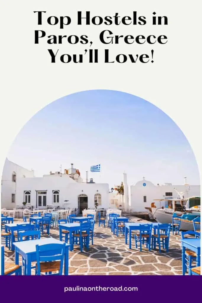 a pin with a terrace with tables and chairs at one of the Hostels in Paros