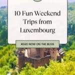 A Pinterest pin promoting Paulina on the Road's article about 10 Fun Weekend Trips from Luxembourg. The image features a medieval castle surrounded by lush green trees.