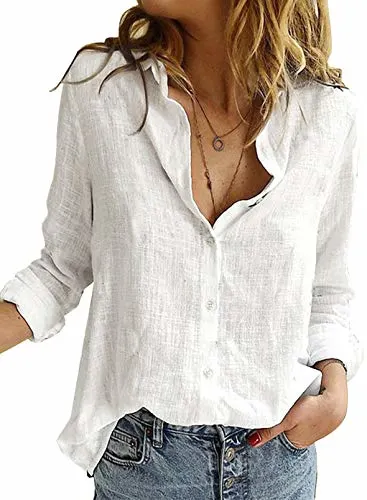 a woman wearing a white top while putting one of her hands in her pocket